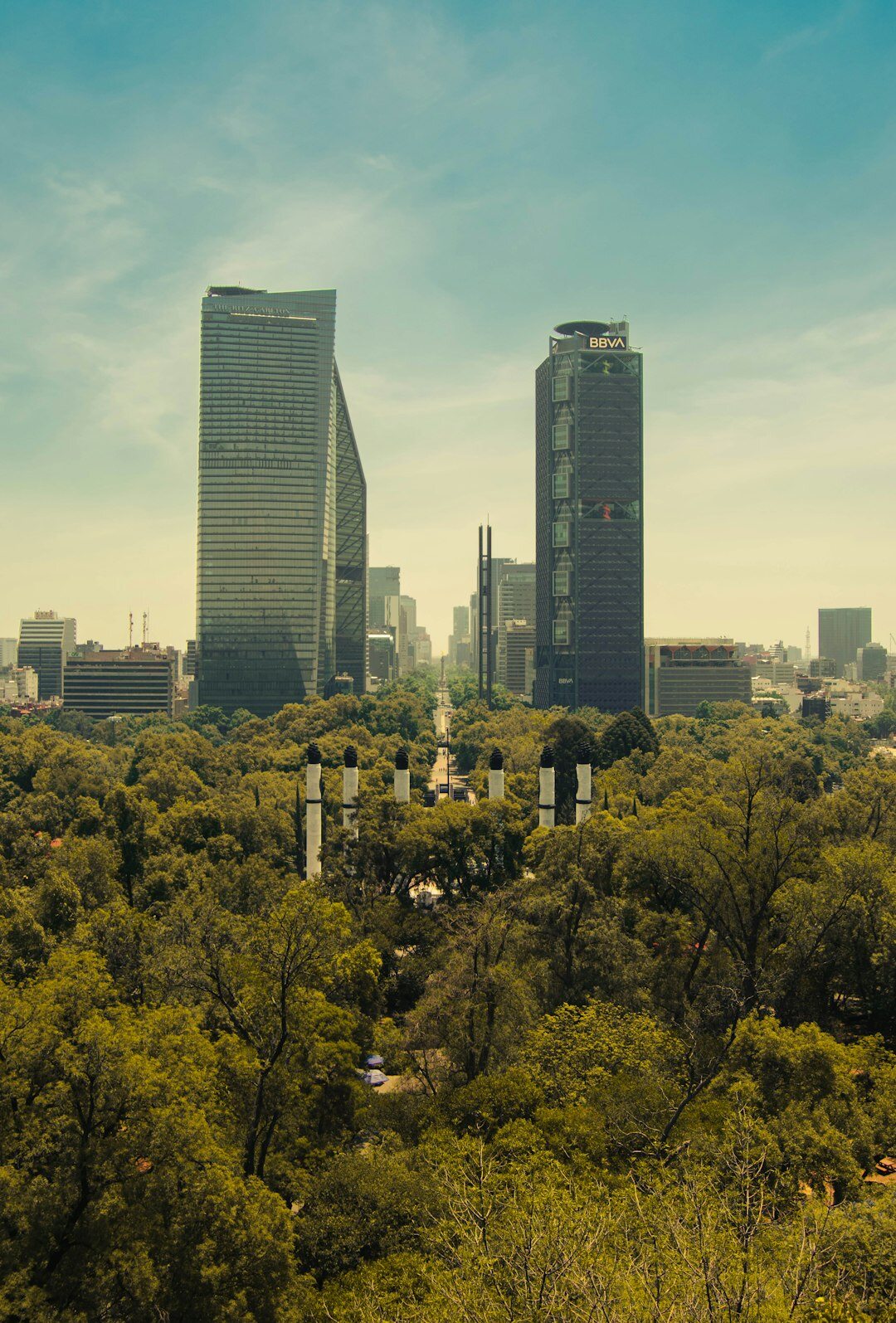 Modern glass office tower in a financial district in Mexico City